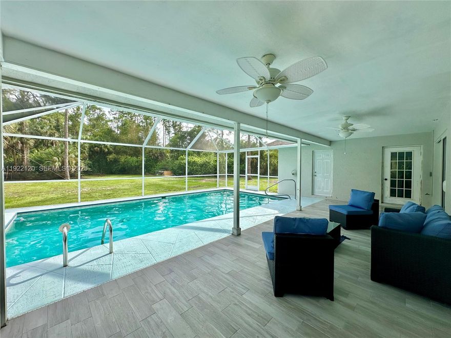 Recently remodeled 3-bed/2-bath home offering about 1,900 sq ft of bright living space on a fully fenced 2.27-acre lot in Golden Gate Estates. High ceilings, a modern kitchen with quartz countertops and stainless steel appliances, and a covered lanai overlooking a private pool provide comfort and style. There’s space for your boat or RV plus two dedicated RV power stations, and you’ll enjoy quick access to Naples’ renowned beaches, shopping and dining.