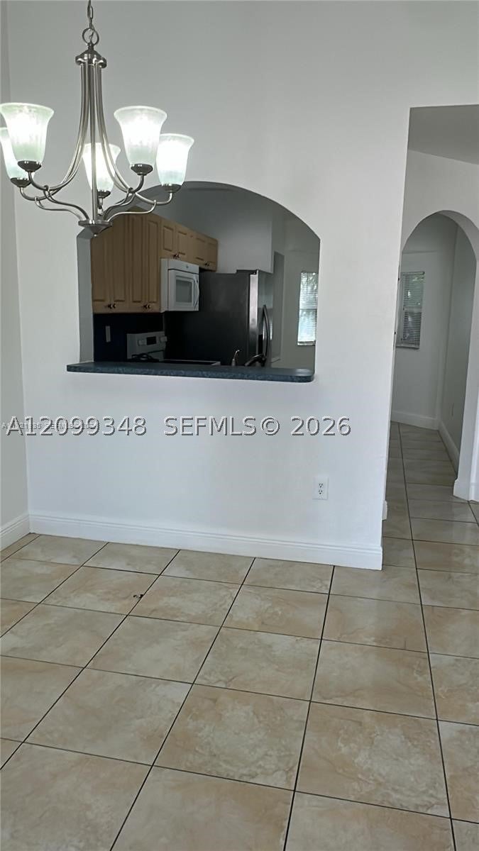 1250 SE 28 203