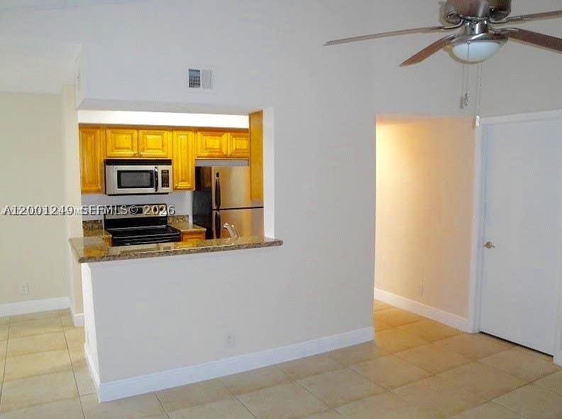 Photo of 5760 Rock Island Rd #340, Tamarac, FL 33319 (MLS # A12001249)