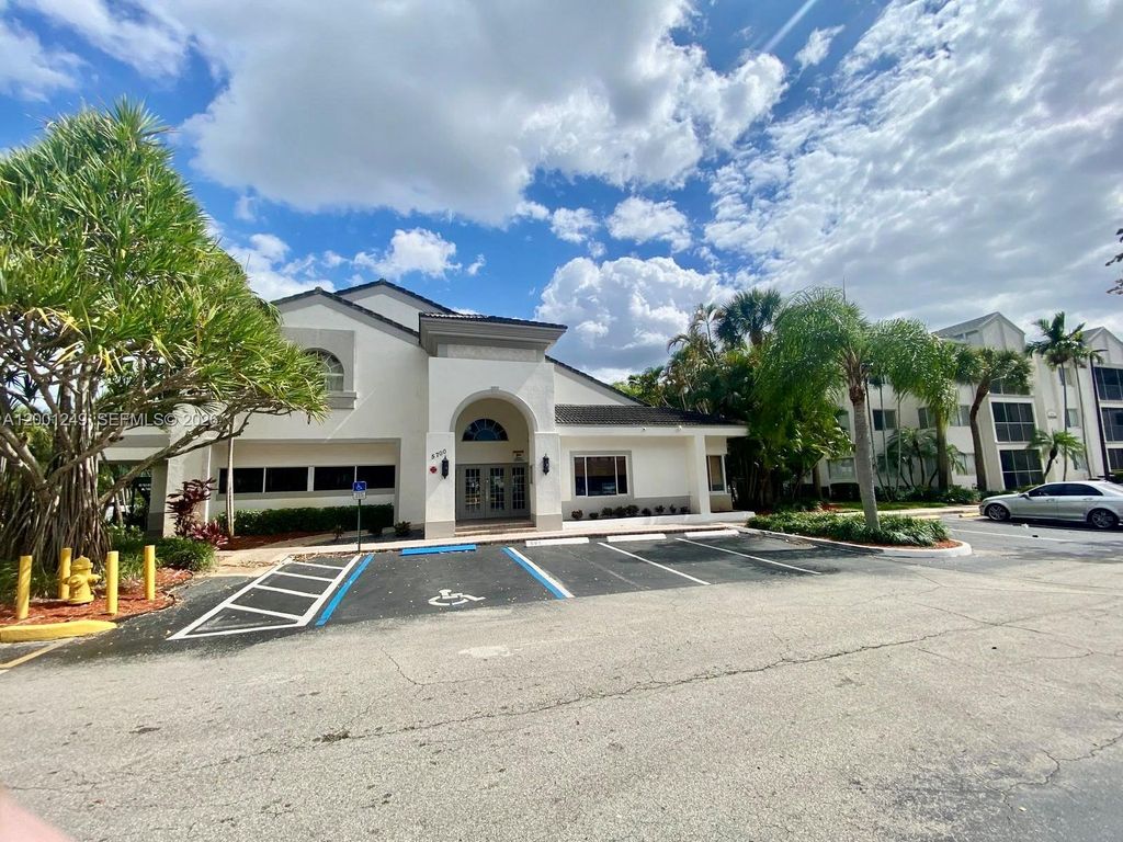 Photo of 5760 Rock Island Rd #340, Tamarac, FL 33319 (MLS # A12001249)