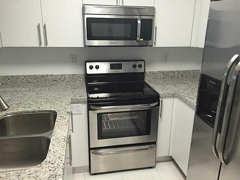 DADELAND PLACE CONDO - Residential Lease