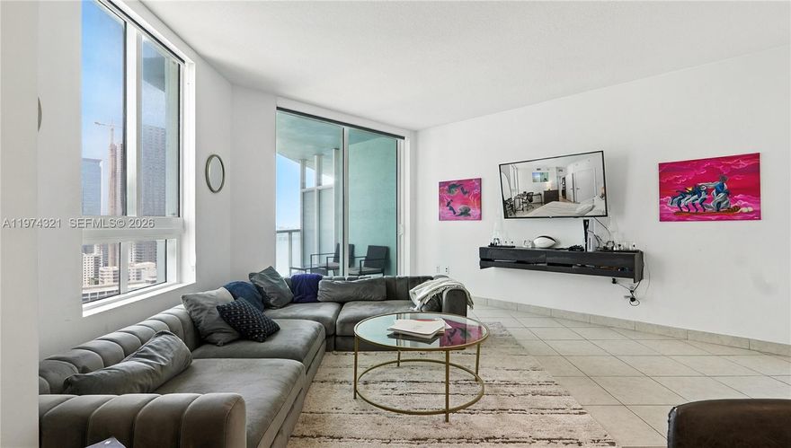 Motivated seller! Bright 1BD/1BA at Quantum on the Bay featuring beautiful Biscayne Bay water views, floor-to-ceiling windows, open layout, and private balcony. Full-service building with 2 pools, fitness center, 24-hr concierge, and convenience store. Located across from Margaret Pace Park and minutes to Brickell, Wynwood, Midtown, and the Design District. Priced to sell.