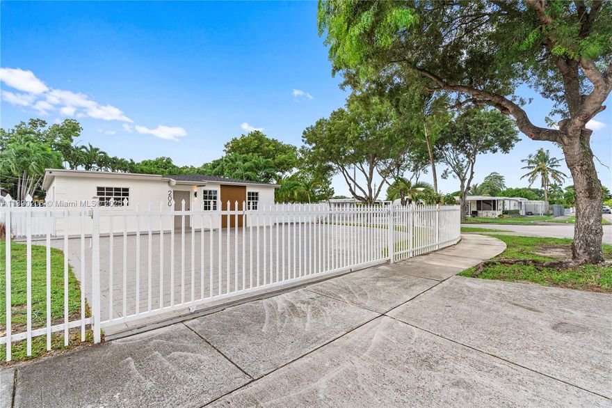 COMPLETELY RENOVATED in 2025, this spacious 4-BEDROOM, 3-BATH, POOL HOME features modern finishes and a flexible open floorplan with TWO EN-SUITE MASTER BEDROOMS, perfect for multi-generational living or guests. Flooded with natural light, it sits on a corner lot with a huge driveway and full fencing for privacy. Enjoy the oversized 16x34 pool, light oakwood floors, and a sleek modern kitchen with built-in pantry. Bathrooms, doors, and millwork are tastefully updated. Major improvements include a BRAND-NEW roof, impact doors, electrical, plumbing, laundry room, and AC system. Centrally located near Amelia Earhart Park, 826, Gratigny, I-95 & more.