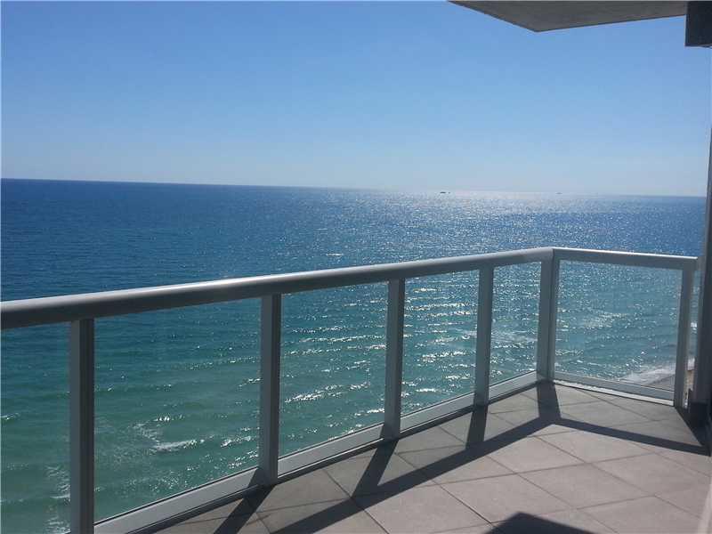 Stunning direct ocean front 2br 2bath corner unit! This is the absolute BEST & rarely available "03" line,on a high floor, featuring incredible unobstructed & wide open ocean and city views from the bright & sunny SE corner. No neighboring building!Marble flooring,brand new stainless steel appliances,granite countertops,2 tiled balconies,custom woodwork,floor to ceiling impact resistant windows,built-in speakers,built-out closets. All in a luxury boutique building w/ pool, gym, direct beach access, valet.