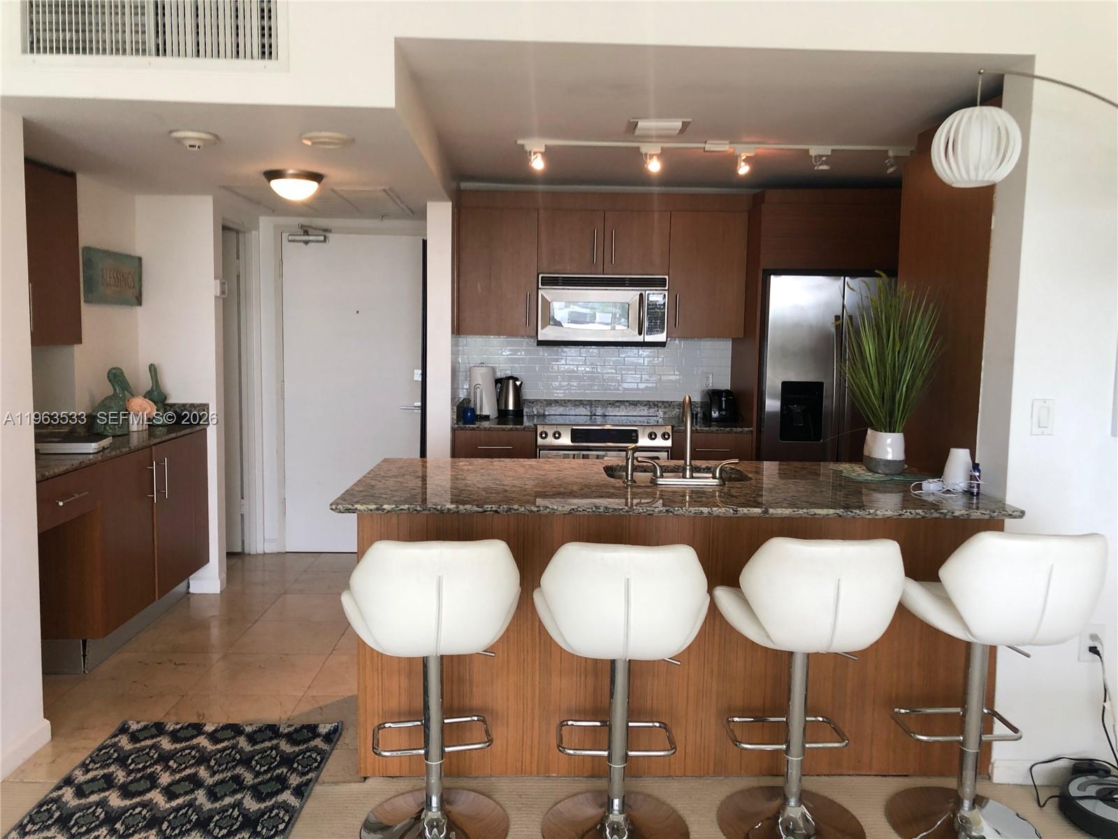 10275 Collins Ave 427