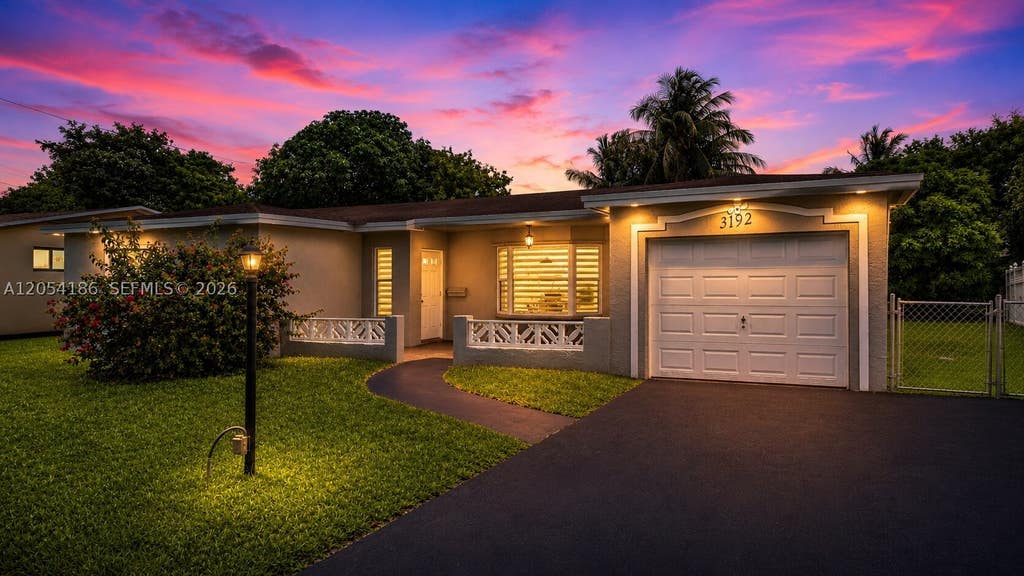 Photo of 3192 NW 40th Ct, Lauderdale Lakes, FL 33309 (MLS # A12054186)