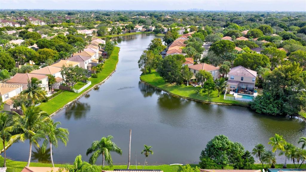 Photo of 1260 NW 110th Ave, Plantation, FL 33322 (MLS # A11923219)