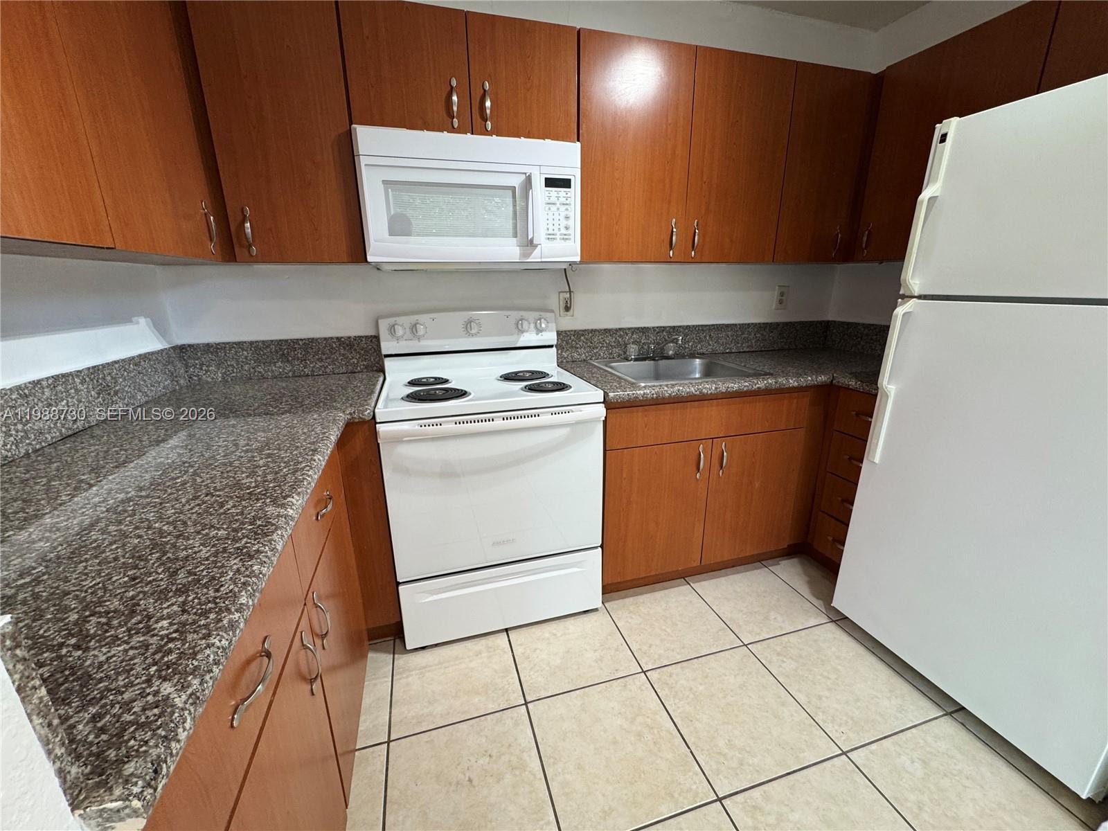 PALMS AT DANIA BEACH COND - Residential Lease