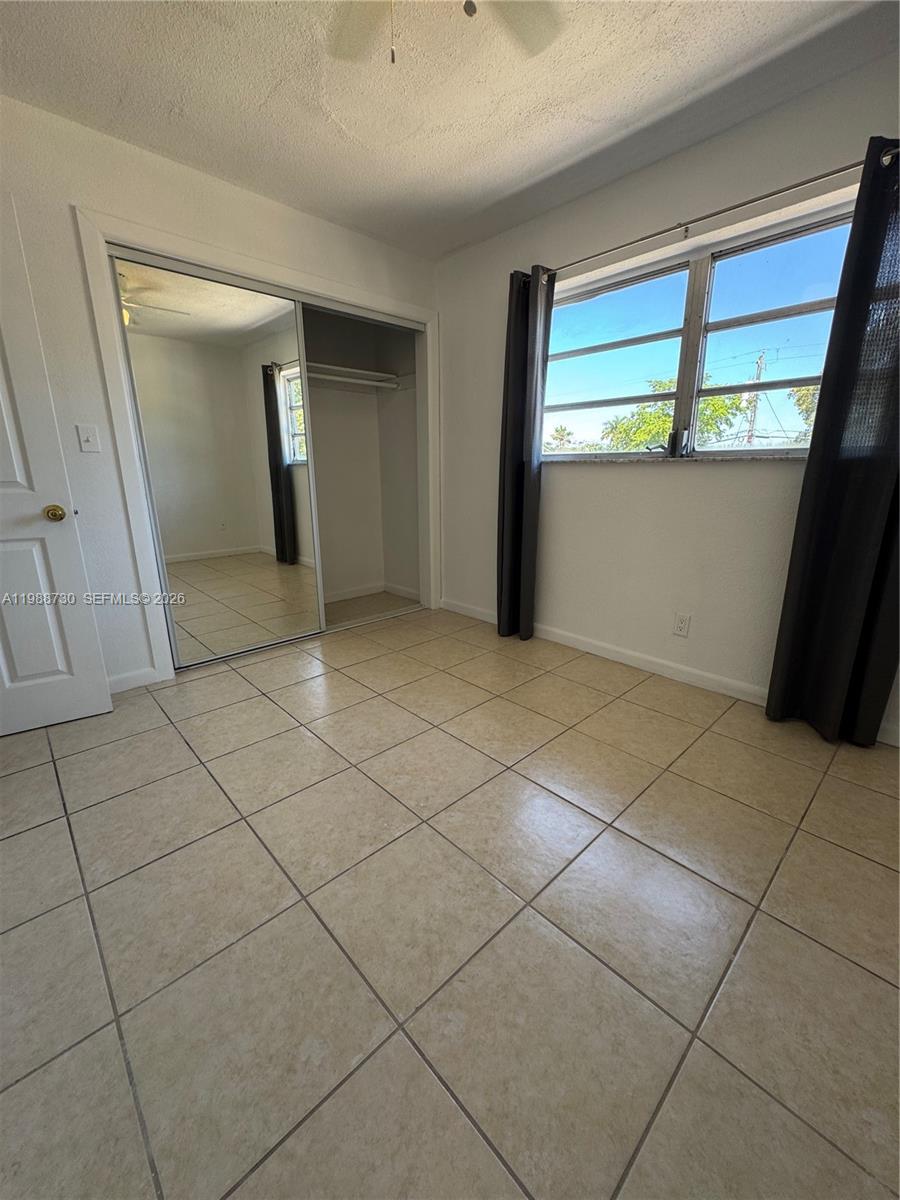 PALMS AT DANIA BEACH COND - Residential Lease