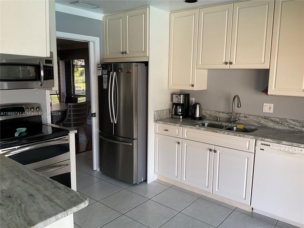 Photo of 7027 NW 38th Mnr, Coral Springs, FL 33065 (MLS # A11666741)