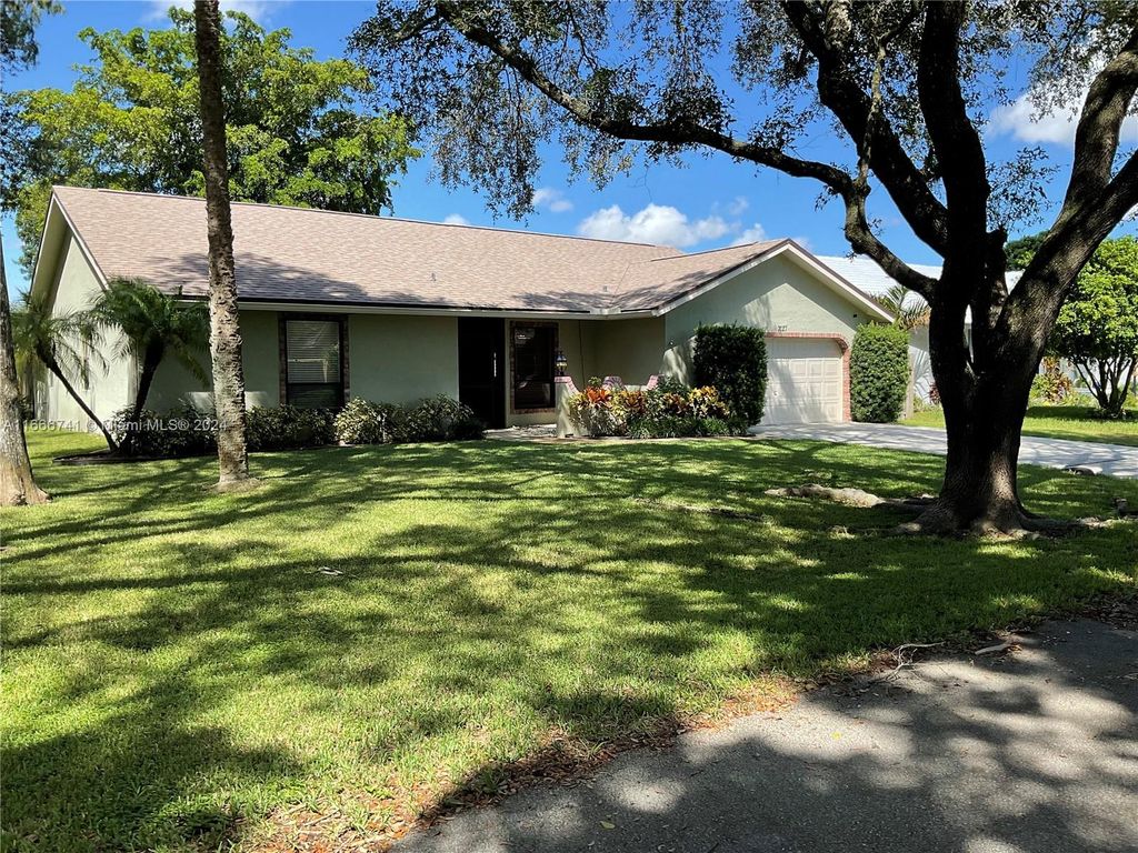 Photo of 7027 NW 38th Mnr, Coral Springs, FL 33065 (MLS # A11666741)