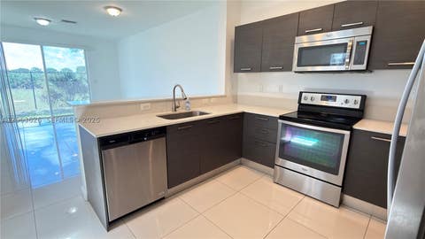 Tiny photo for 3418 NW 13th St, Lauderhill, FL 33311 (MLS # A12063626)