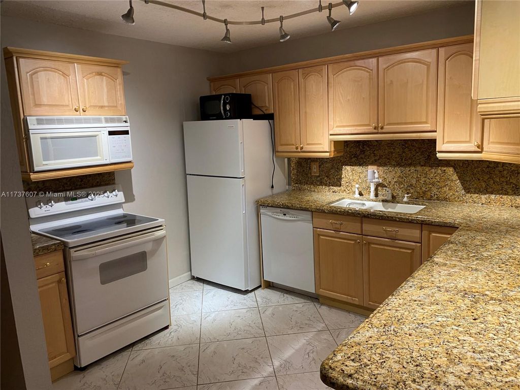 Photo of 4200 NW 3rd Ct #216, Plantation, FL 33317 (MLS # A11737607)