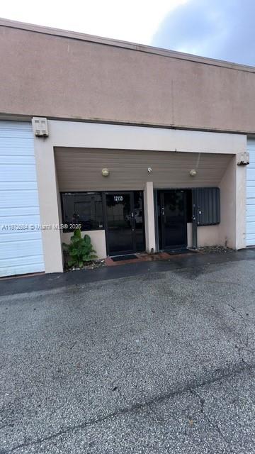Great warehouse/office loft combination in the heart of the Kendall Business District. Easy access to the Florida Turnpike, Kendall drive and more. Thousands of cars in the area daily for exposure. Located in a small condominium warehouse building with storefront, bay door, loft space. 640 sq ft including loft . The entire space has central AC, alarm system, you can install but already pre-wired. Excellent for small business, accountant, medical, export business, etc. No mechanics, vehicle dealers, or music studios. Rent is $1700 with first, last and security required. Currently vacant and easy to tour. Call for an appointment. Business credentials required.