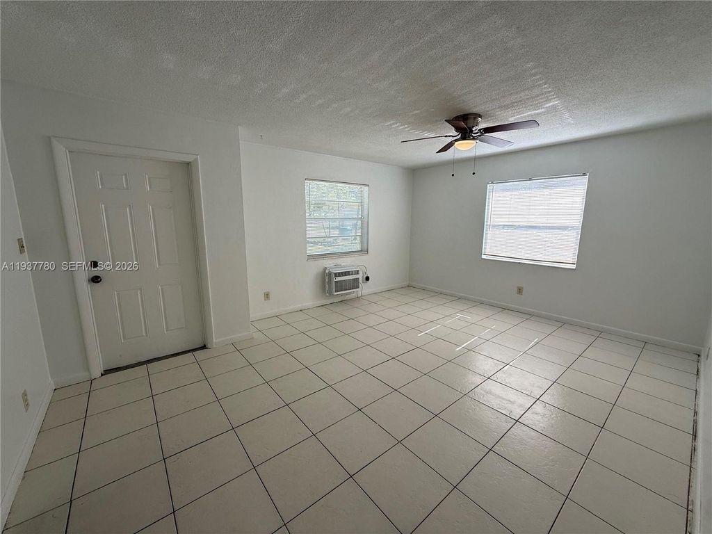 Photo of 1620 NW 52nd Ave #A, Lauderhill, FL 33313 (MLS # A11937780)