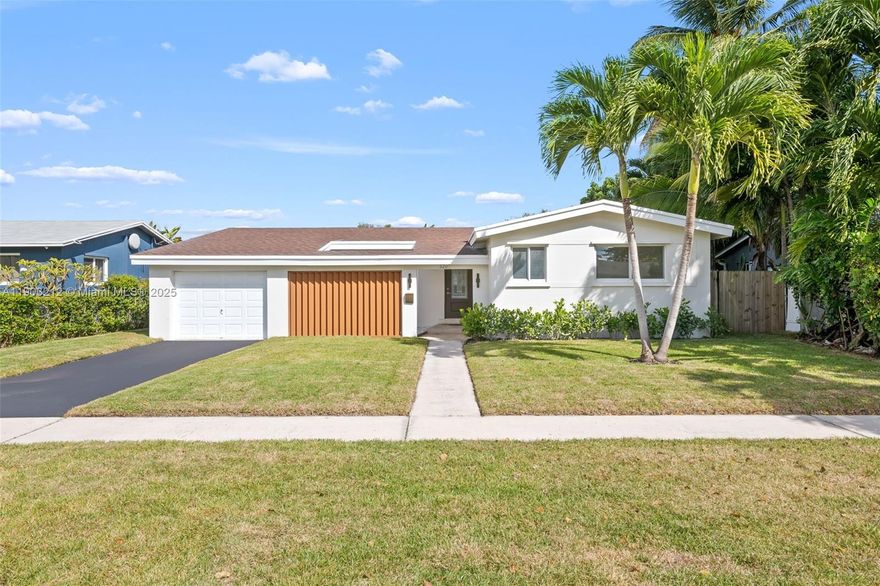 Welcome to your dream home at 3207 Wilson St. in Hollywood FL! This charming single-family home offers an open floor plan accentuated by vaulted ceilings, perfect for modern living. With 3 bedrooms and 2 bathrooms, the home features a spacious master suite complete with a large bathroom for added luxury and comfort. Step into the heart of the home, a modern kitchen equipped with brand new appliances, ready to inspire your culinary adventures. The home boasts a brand new roof and a 2-year-old AC, ensuring your comfort year-round. Enjoy Florida's beautiful weather from the large screened-in patio, or take advantage of the expansive backyard, which has ample space for a pool. The property includes a 1-car garage and an additional laundry room, adding convenience to your daily routine.