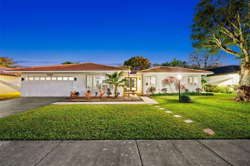 Bright and contemporary, this completely renovated beauty on a no-thru street is defined by its huge rooms, high ceilings, abundant picture windows/glass doors, and a host of eye-catching designer touches. Awash in sunlight enhanced by extensive recessed lighting, the ambiance is fresh and uplifting. The kitchen is a highlight, w/ocean-blue accent cabinets, granite counters, and stainless-steel appliances. The giant open plan kitchen and family room overlook the pool, patio, and large fenced yard w/privacy landscaping. Additional amenities include wood-look vinyl flooring throughout w/tiled baths, a 2-car garage, laundry, ceiling fans, and accordion shutters. The quiet setting is near A-rated schools, w/quick access to Kendall Drive, expressways, and US1.