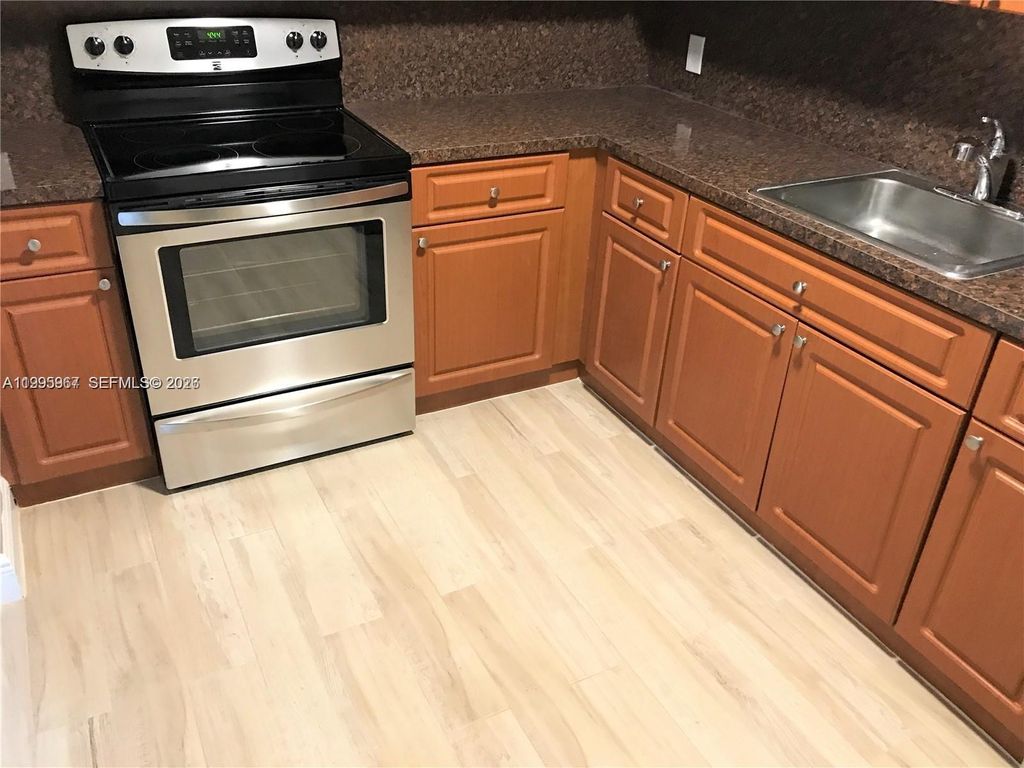 Photo of 4848 NW 24th Ct #325, Lauderdale Lakes, FL 33313 (MLS # A11995967)