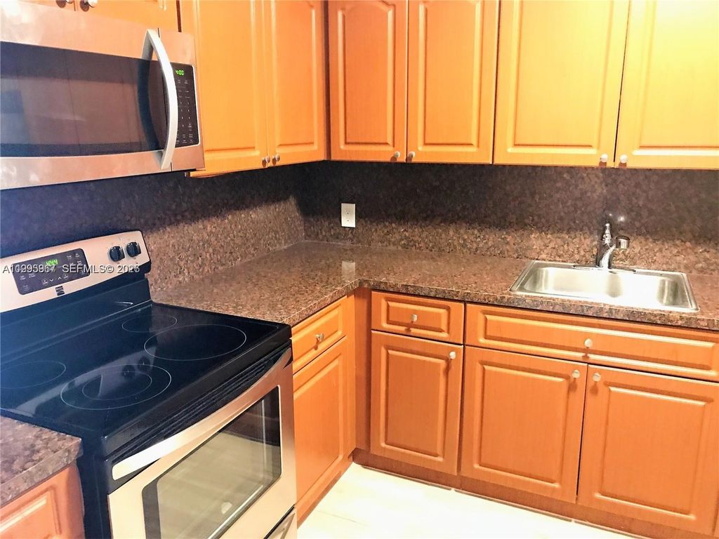 Photo of 4848 NW 24th Ct #325, Lauderdale Lakes, FL 33313 (MLS # A11995967)