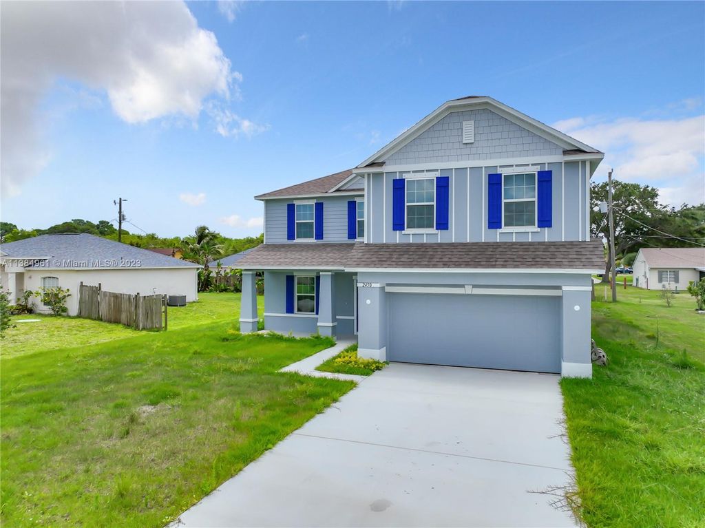 Photo of 2450 SE Toledo Ave, Port Saint Lucie, FL 34952 (MLS # A11384961)
