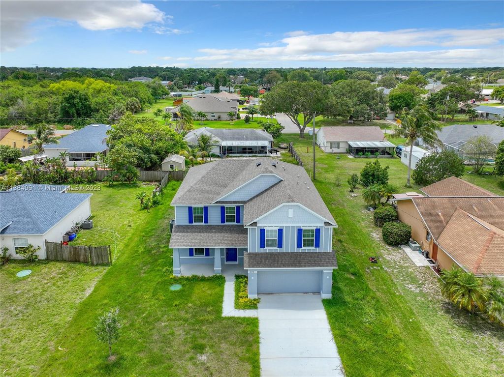 Photo of 2450 SE Toledo Ave, Port Saint Lucie, FL 34952 (MLS # A11384961)