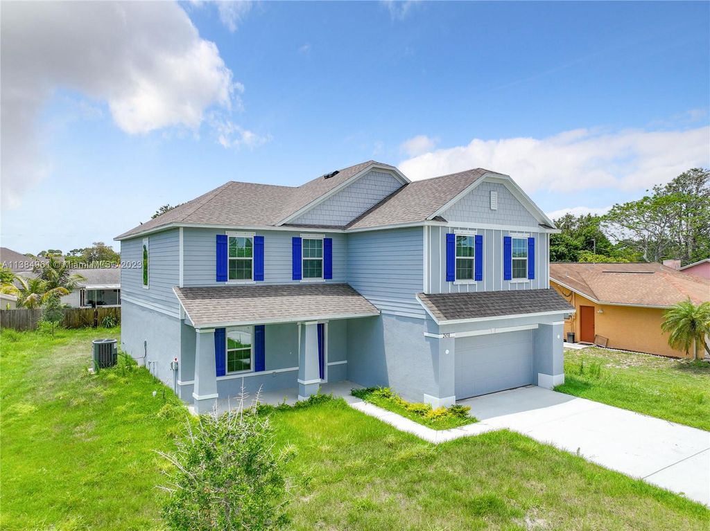 Photo of 2450 SE Toledo Ave, Port Saint Lucie, FL 34952 (MLS # A11384961)