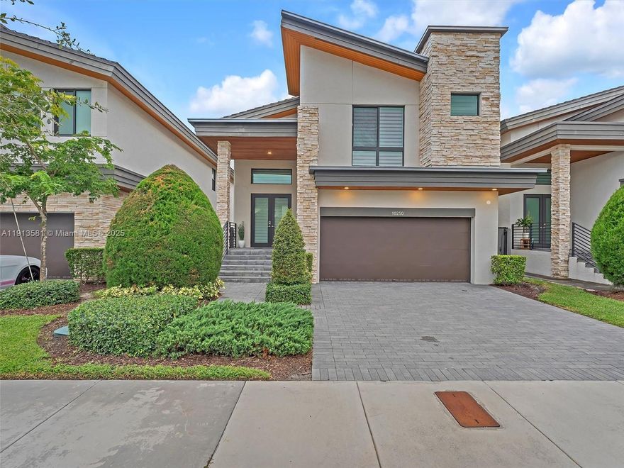 Discover this stunning 4BR/4BA home in gated Pineapple at Pinnacle Park Central, Doral. Designed for modern living, it features an open-concept layout, elegant finishes, and a gourmet kitchen with premium appliances under MyChoice warranty, a spacious island, and sleek cabinetry. Enjoy spacious bedrooms with ample closets and spa-inspired baths featuring double vanities, glass showers, and soaking tubs. Private patio with sparkling pool, ideal for relaxing or entertaining. Resort-style amenities include access to the Grand Central Clubhouse with multiple pools, tennis courts, soccer field, fitness center, spa, and elegant social spaces—all within a beautifully landscaped, secure community. Prime location near shopping, dining, highways, and A-rated schools.