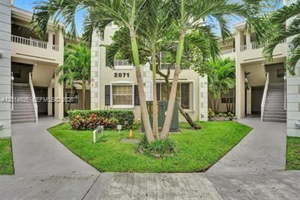 Photo of 2871 N Oakland Forest Dr #210, Oakland Park, FL 33309 (MLS # A12014505)