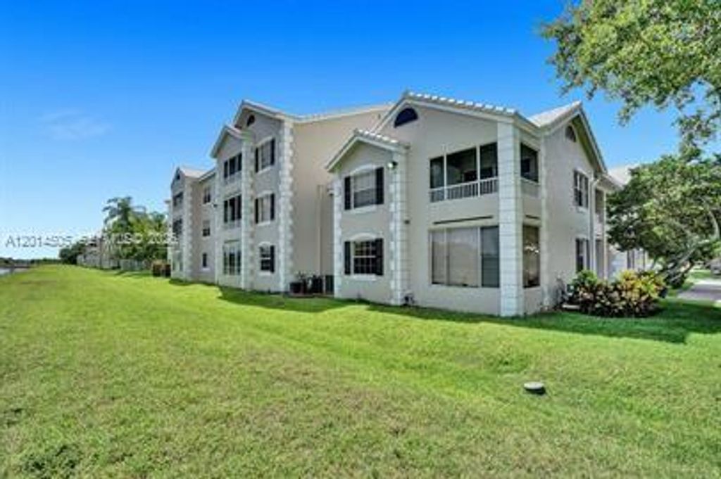 Photo of 2871 N Oakland Forest Dr #210, Oakland Park, FL 33309 (MLS # A12014505)