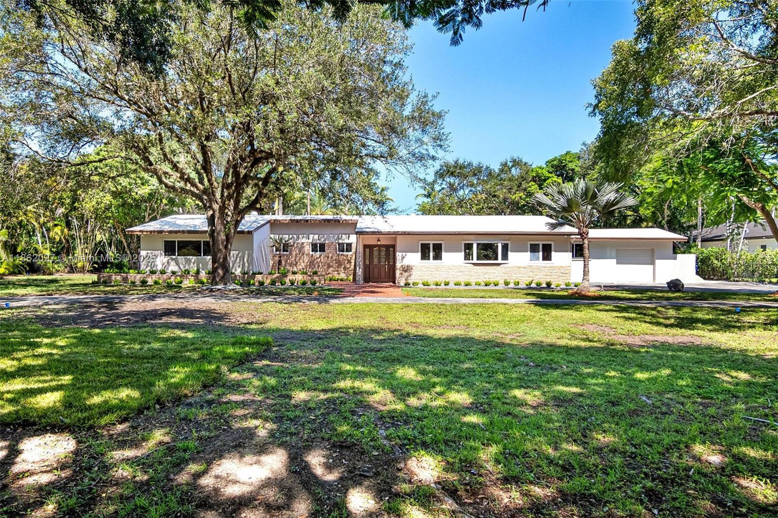 Nestled on one of the most desirable streets in the Kendall/Brenda?Estates area, this spacious 4-bedroom, 2-bath single-family home spans approximately 3,026?sq?ft—larger than tax records reflect—and sits on nearly a 0.9-acre lot. Elegant marble and wood floors flow throughout the open living and dining areas, highlighted by Sub-Zero appliances, a gated electrical entrance, circular driveway, and detached one-car garage. Outdoors, enjoy your own in-ground pool, tiki gazebo, patio, and fruit trees. Ready to move-in—this gem is a must-see!