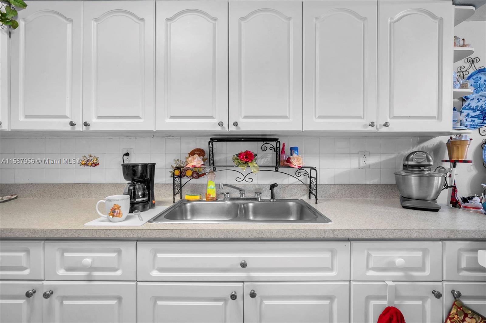 PALM-EAST GARDENS CONDO - Residential