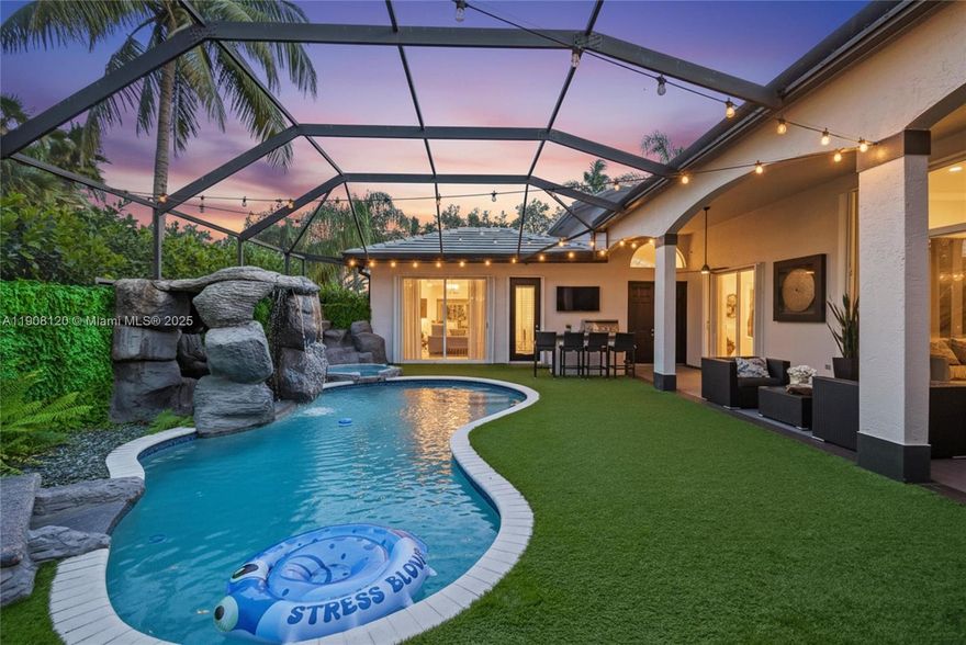 Fully renovated, one of the few courtyard homes in the gated community of The Landings in Weston. This modern estate features a new roof 2024, elegant porcelain floors, custom wine cellar, fully updated gourmet kitchen with top-tier appliances, with an expansive island that flows into the open living & dining areas. Enjoy a resort-style heated pool with cascading waterfalls, a summer kitchen, and a second outdoor space, a spacious turfed backyard. The spacious primary suite is located on the 1st floor and offers 2 custom walk-in closets and a fully updated bathroom. A separate 1BR/1BA in-law suite overlooking the pool. This property is turn-key and move-in ready. Conveniently located near A+ rated schools, parks, shopping, dining, and major highways. Schedule your private tour today.