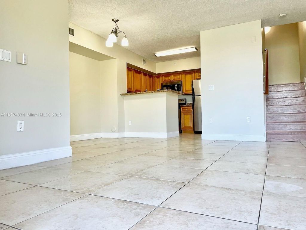 Photo of 12178 Saint Andrews Pl #104, Miramar, FL 33025 (MLS # A11817483)