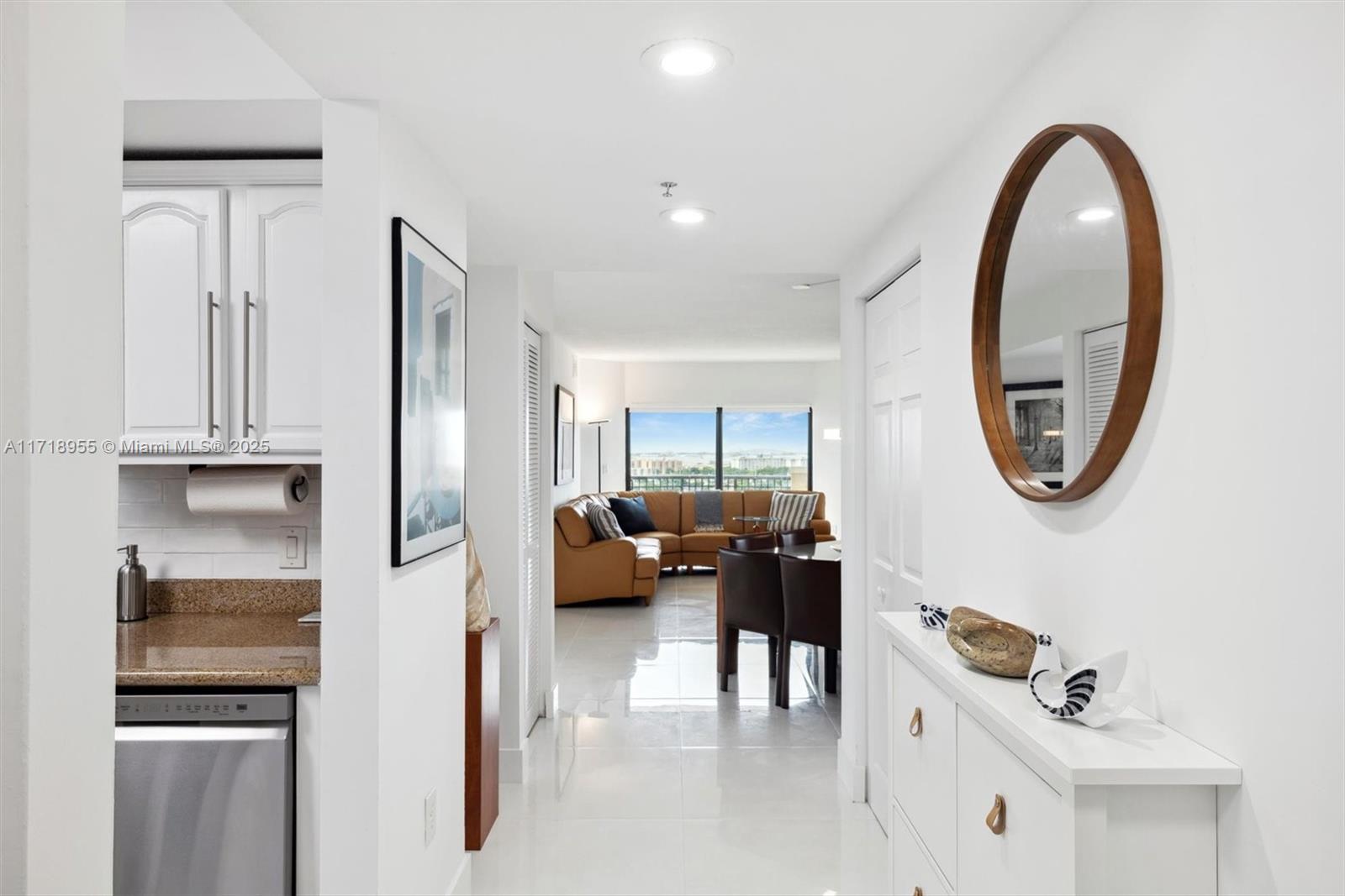 Don't miss this opportunity to own a renovated contemporary 3 bed/2 bath condo on the 11th FL with almost 1,300 Sq ft, magnificent views, 2 garage parking spaces, exceptional privacy and 24 hr security. Abundance of natural light creating a warm atmosphere. Hurricane windows. Two walk-in closets. All LG Stainless steel appliances (2023). LG Washer & Dryer and W/Heater (2023). Amazing expansive panoramic views of Miami from living area, bedrooms and large balcony. Low association fee in a very well maintained elegant building with a beautiful lobby, gym, large pool and clubhouse. Prime location minutes from world renowned Coral Gables (with Merrick Park exclusive shops and restaurants), Coconut Grove and Miami Beach. Don't hesitate-call now to be the first in line for this incredible value.