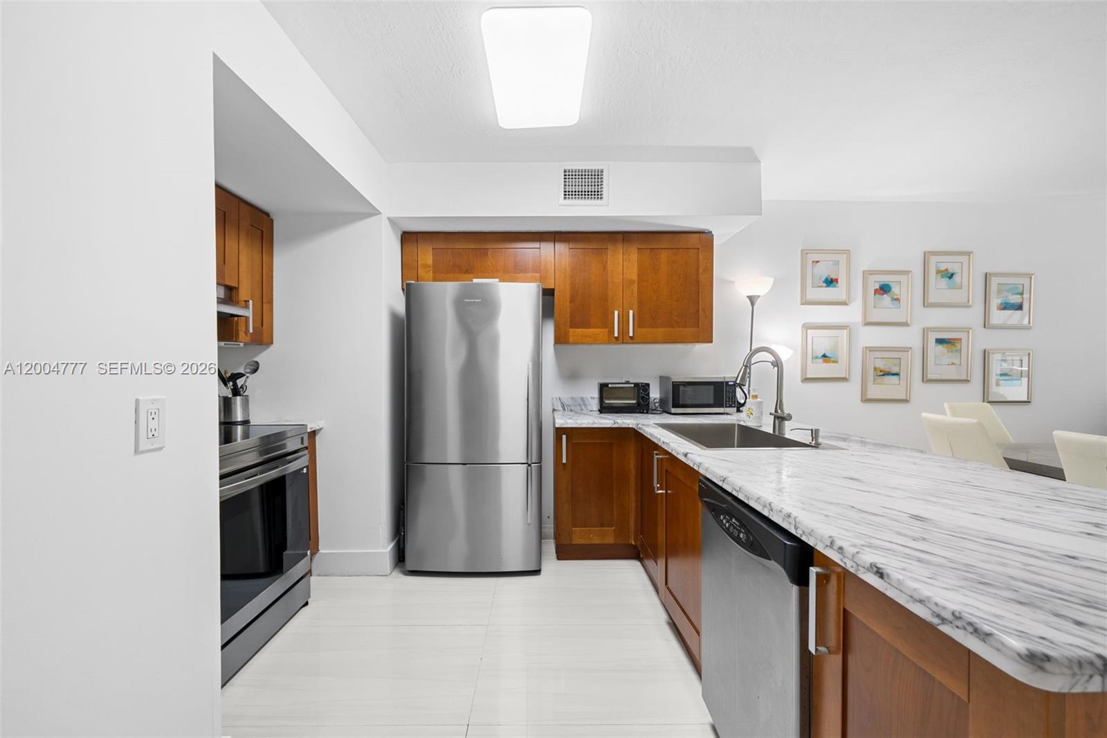 9499 Collins Ave 207