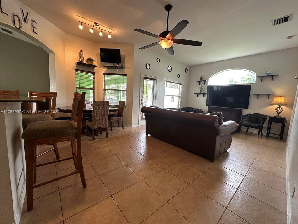 Photo of 1214 SW Patricia Ave, Port St Lucie, FL 34953 (MLS # A11783997)