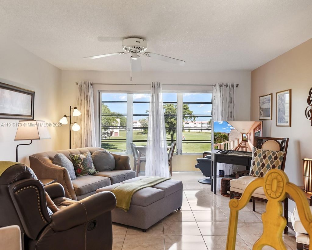 Photo of 9401 Sunrise Lakes Blvd #302, Sunrise, FL 33322 (MLS # A11919170)