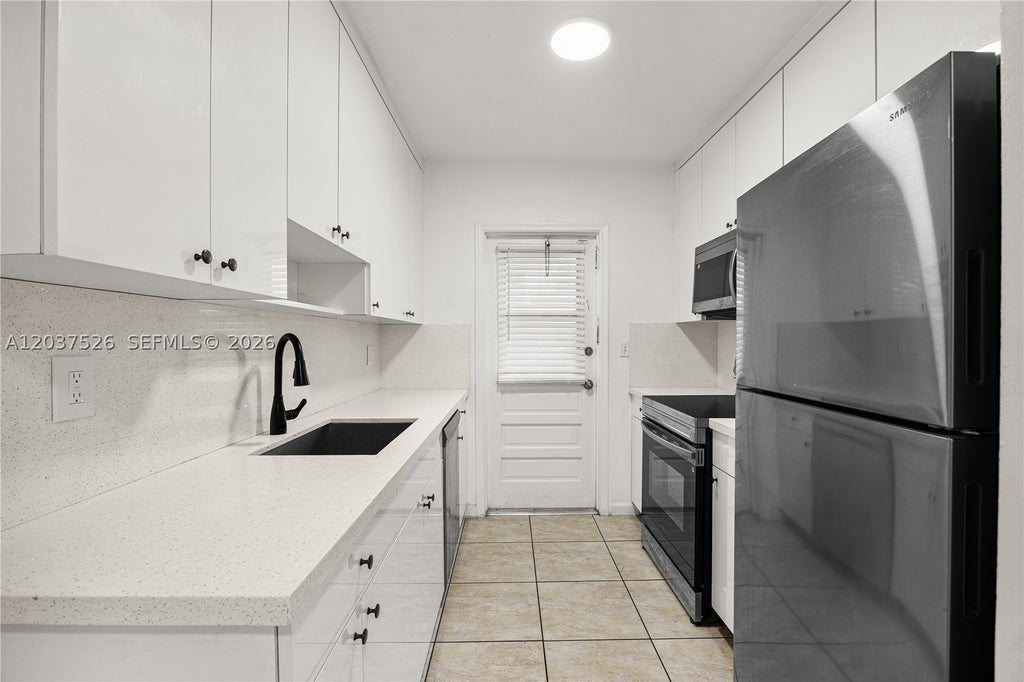 Photo of 5141 Hollywood Blvd #104, Hollywood, FL 33021 (MLS # A12037526)