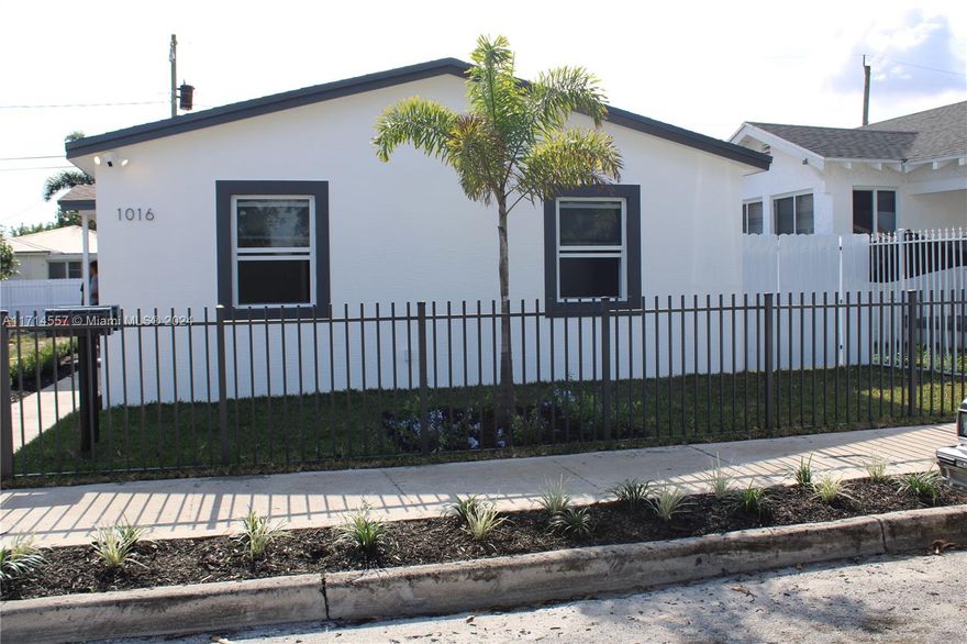 Welcome to this beautifully renovated 2-bedroom, 1-bathroom home located at 1016 State Street in the heart of West Palm Beach. This modern residence blends style, comfort offering the perfect retreat for those seeking a move-in ready home in a prime location. Step inside and be greeted by an open and airy floor plan, featuring sleek, high-end finishes throughout. The spacious living area boasts plenty of natural light and flows seamlessly into the newly updated kitchen, which includes custom cabinetry, stainless steel appliances, and luxurious countertops — perfect for preparing gourmet meals and entertaining guests. Both bedrooms are generously sized with ample closet space, providing a tranquil oasis to unwind.