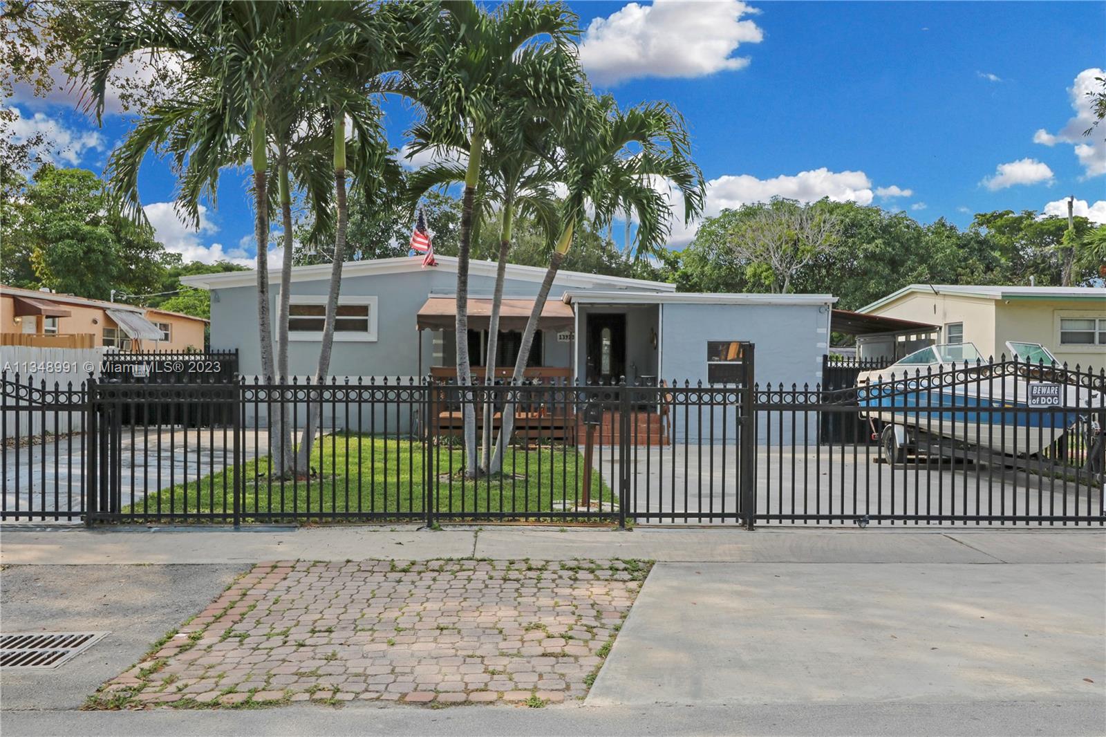 Property is physically bigger than tax roll. As per owner, approximately 1400 sq ft. Don't miss out on the spacious home that offers a gated fence and two concrete driveways located in the heart of North Miami. Updated kitchen with granite countertop. Laundry room with full-size washer and dryer. Central A/C 3 years old, above-ground pool with sun deck. Storage shed with electricity. The home is 1670 Sqft per owner. It is centrally located in a friendly neighborhood close to Enchanted Forest Park, shops, Universities, airports, highway access, and more.