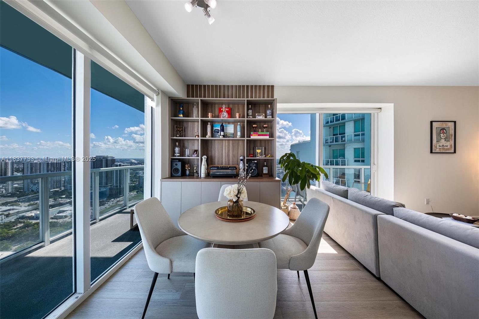 **Association has full reserves; Make this beautiful condo your primary residence with as low as 5% Down Payment** Located in the highly desirable Quantum on the Bay in vibrant Edgewater, this bright unit features a modern kitchen, sleek porcelain wood-look flooring throughout, a custom-built bar in the dining area and spacious walk-in closets. Enjoy access to resort-style amenities including 2 swimming pools, a gym, 2 saunas, a club room, playground, business center, billiards, valet, and 24/7 concierge. Perfectly located across from Margaret Pace Park and Biscayne Bay, and just minutes from Wynwood, Downtown, the Design District, and Miami Beach. A must-see for those seeking comfort, style, and convenience in one of Miami’s most exciting neighborhoods. Includes 1 assigned parking space.
