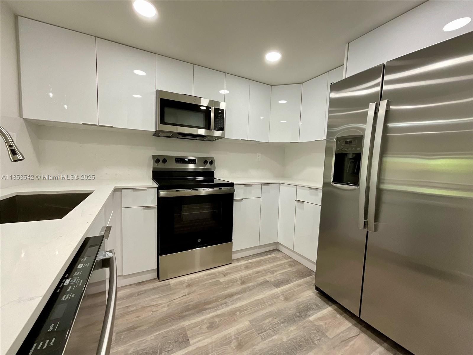Impeccable Move-In-Ready 1 bed/1 bath apartment in Pine Grove Condominium. This stunningly updated unit features a bright living space full of natural light, complemented by a large screened balcony, ideal for hosting or simply relaxing. The oversized bedroom with walk-in closet offers plenty of storage space. The kitchen boasts modern quartz countertops and new s/s appliances. Additional features include 1 assigned parking, accordion shutters, AC , and tankless WH, Minutes away from Miami Dade College, Baptist Hospital, Palmetto Expressway, Turnpike, shops, restaurants and parks. Amenities include laundry next to unit, 2 pools, children's play area, clubhouse with a pool table and in house HOA!