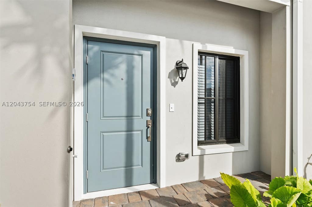 Photo of 6007 Coralberry St, Haverhill, FL 33415 (MLS # A12043754)