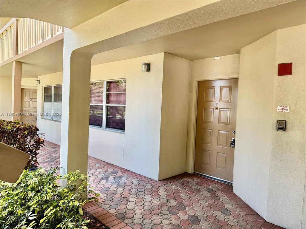 Photo of 1601 Abaco Dr #B1, Coconut Creek, FL 33066 (MLS # A11863850)