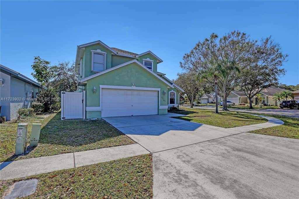 Photo of 1701 Primrose Ct, Port Saint Lucie, FL 34952 (MLS # A11723902)