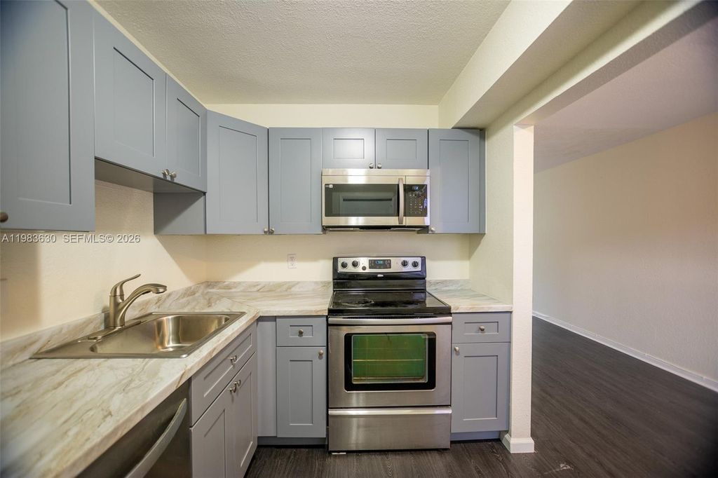 Photo of 4803 NW 9th Dr #4803, Plantation, FL 33317 (MLS # A11983630)