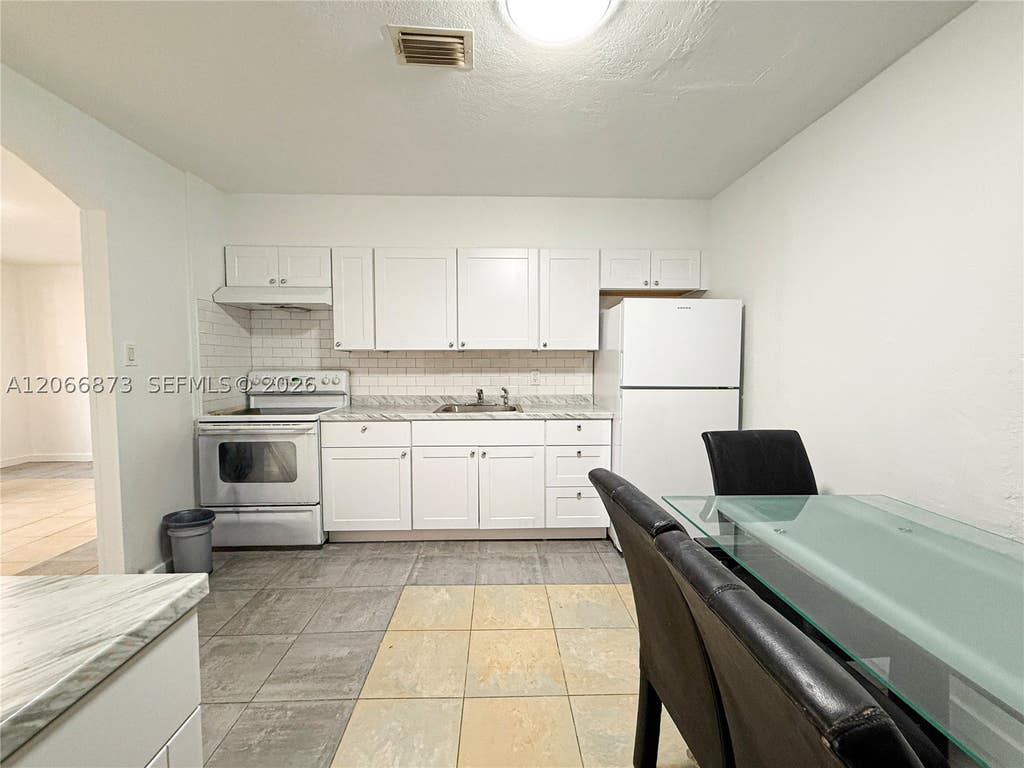 Photo of 7110 Custer St #1, Hollywood, FL 33024 (MLS # A12066873)