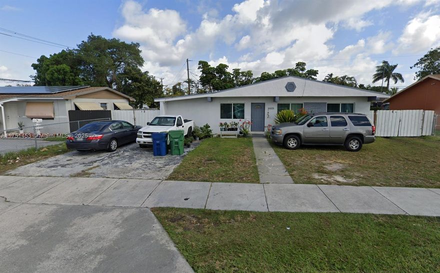 Amazing opportunity in prime location. Roof installed in 2018 with 25 years warranty, HIGH IMPACT WINDOWS (2023), A/C 3 YEARS OLD,wood kitchen cabinets, with quartz counter tops, SS appliances. Boasting 3 large bedrooms, 1 bath, laundry room, family room, dinning, Florida, plus  room (converted in a 4th bedroom with another bathroom inside, ****(income producer)**** and lots of parking for multiple vehicles or bring your RV. Fantastic starter home for large family or incredible investment. Minutes from turnpike, close to shopping, entertainment and much more. This is the one! Don't miss out. MOTIVATED SELLERS.!!!