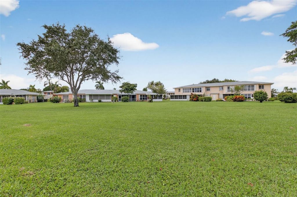 Photo of 1520 NW 19th Ter #102, Delray Beach, FL 33445 (MLS # A11904571)