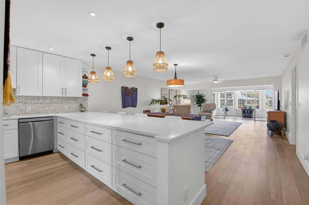 Photo of 1520 NW 19th Ter #102, Delray Beach, FL 33445 (MLS # A11904571)